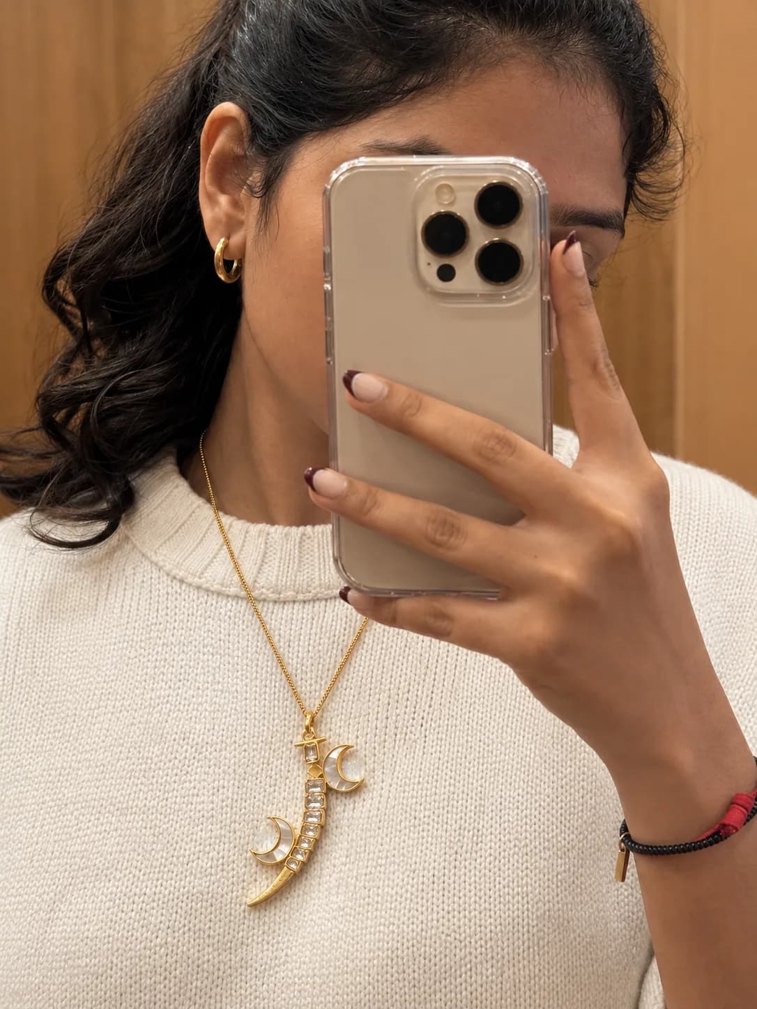 Āhna Pendant – worn close-up