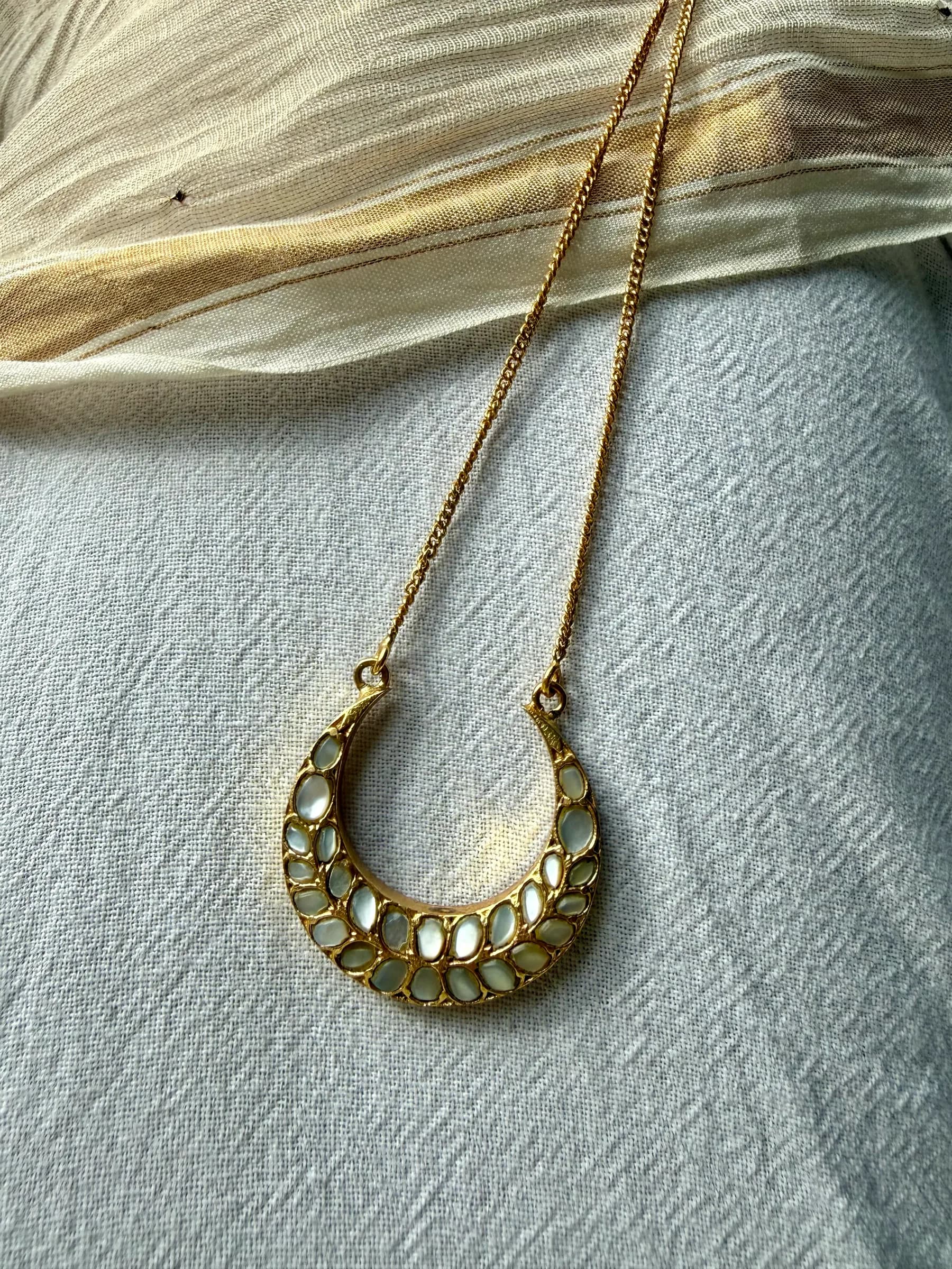 Indu Pendant – Mother-of-Pearl – worn close-up